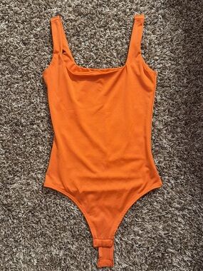 Classic Orange One-Piece Bodysuit